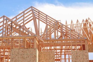 stick built house under construction framing
