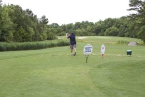 tmba golf tournament 2016 man swinging fareway