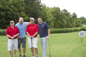 tmba golf tournament 2016 4 posing together on green priority title