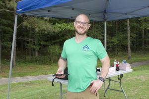 tmba golf tournament 2016 male green shirt at tent